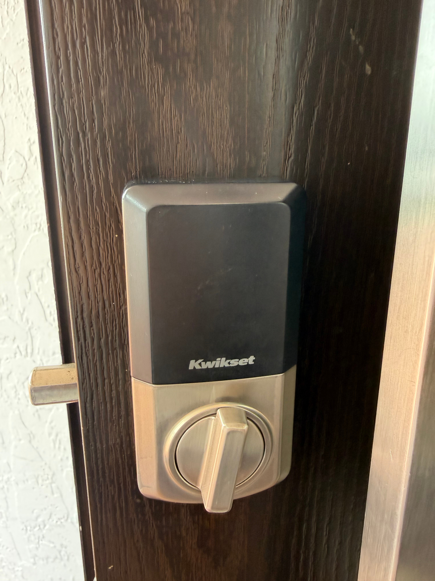 Smart door lock installation — interior thumbturn